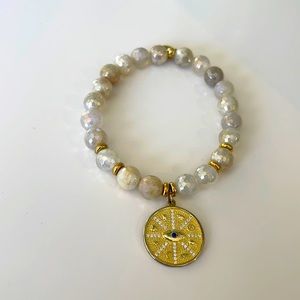 T Jazelle Moonstone With Gold Evil Eye